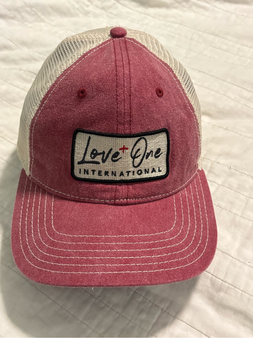 LoveOne International Pink Trucker Hat